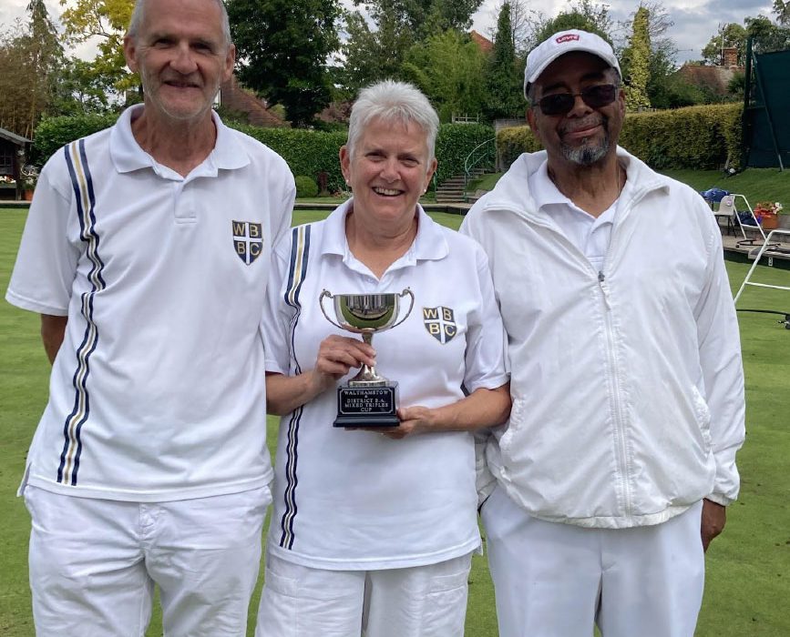 Kevin Bates, Sue Bates and Fitzroy Johnson with the MIxed Triples trophy